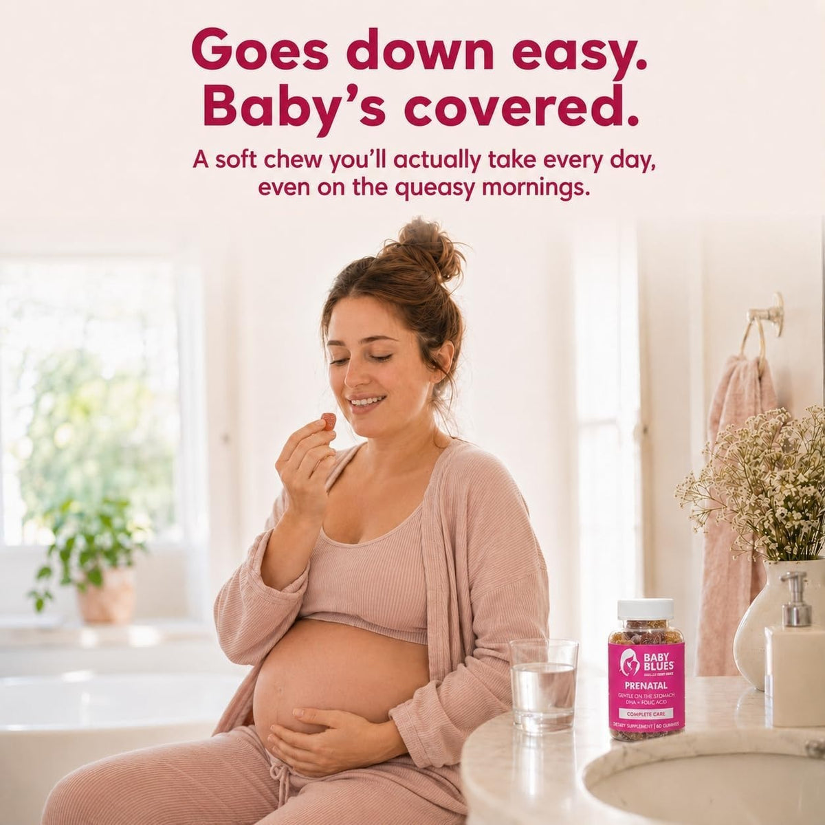 Pregnant mom taking a prenatal gummy