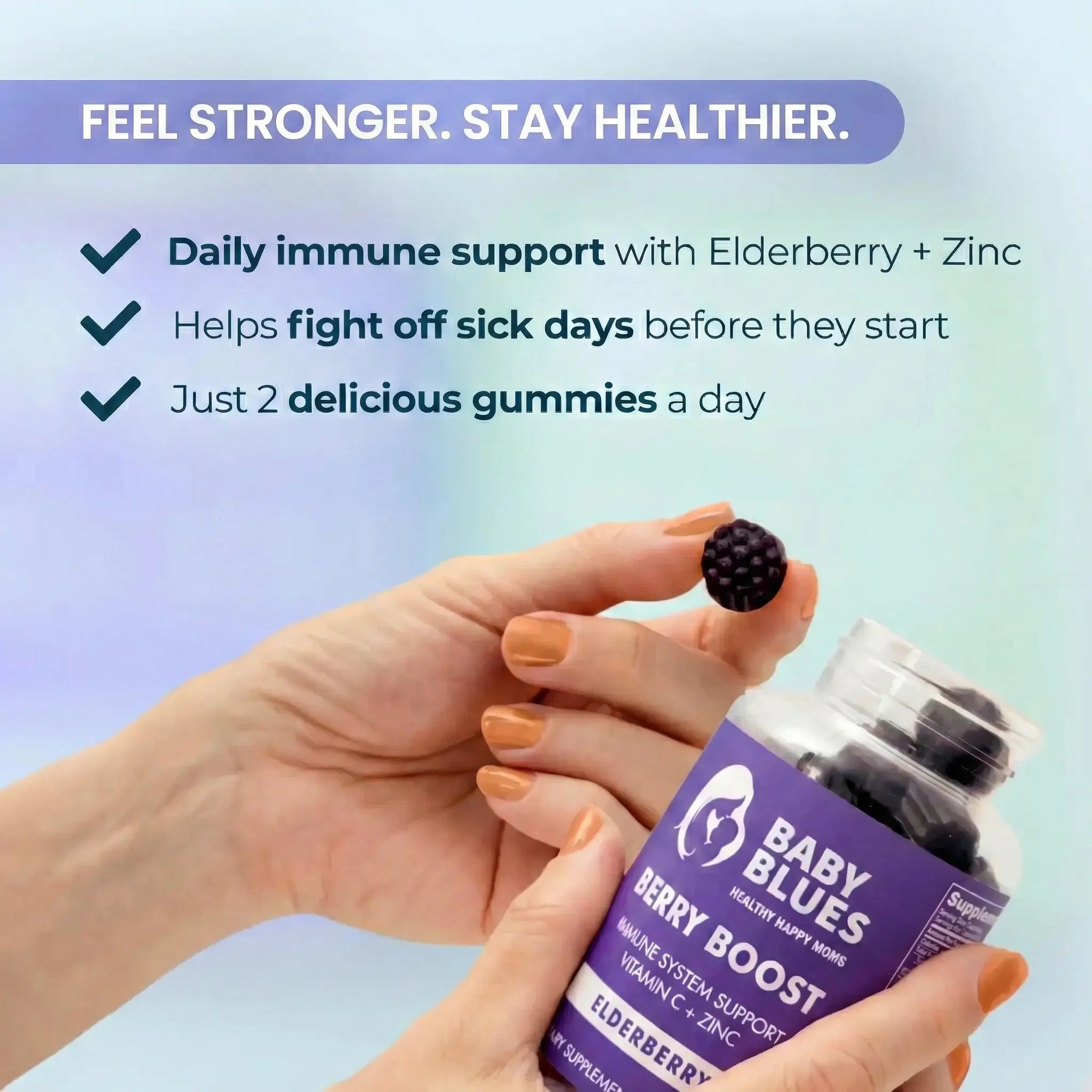 Woman holding Baby Blues Berry Boost elderberry gummies bottle with immune support benefits including elderberry zinc and vitamin C